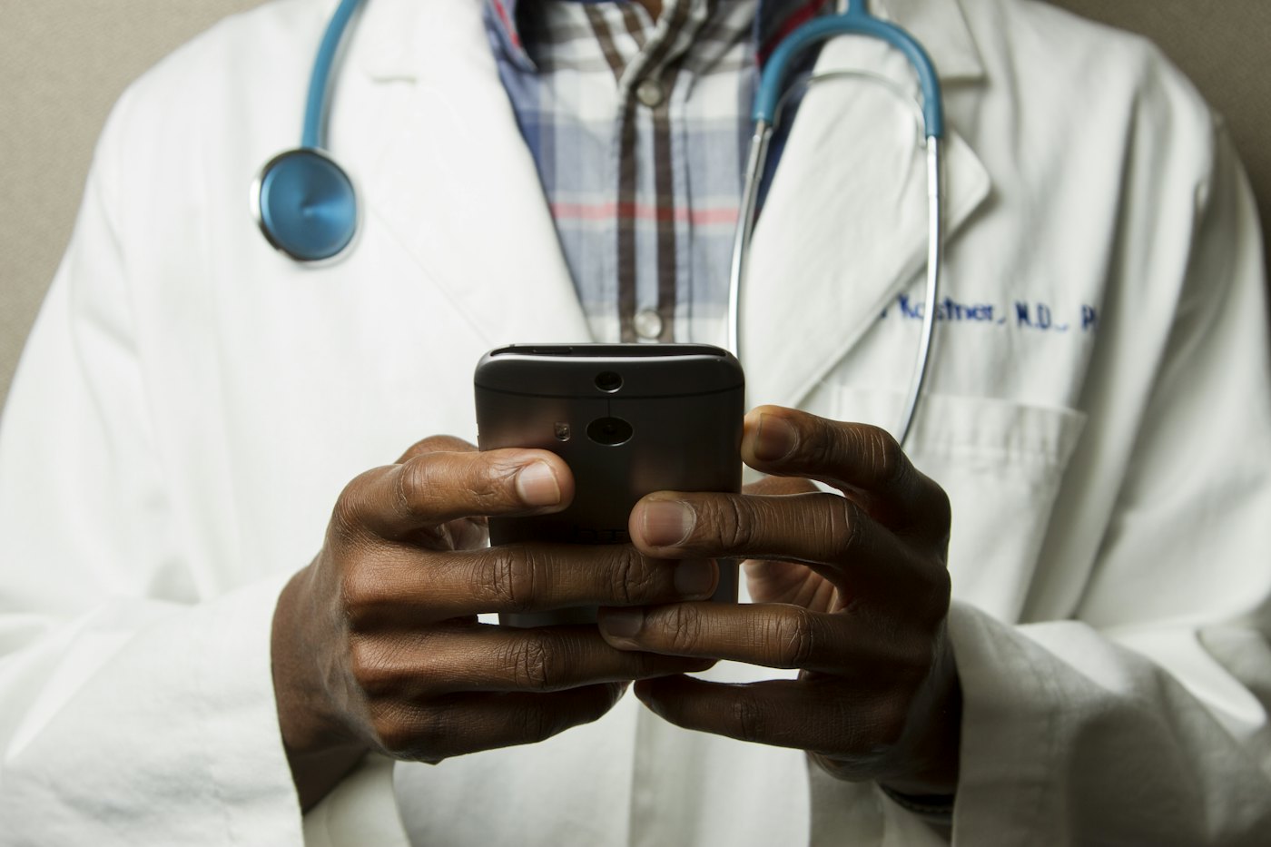 Physician using a smartphone