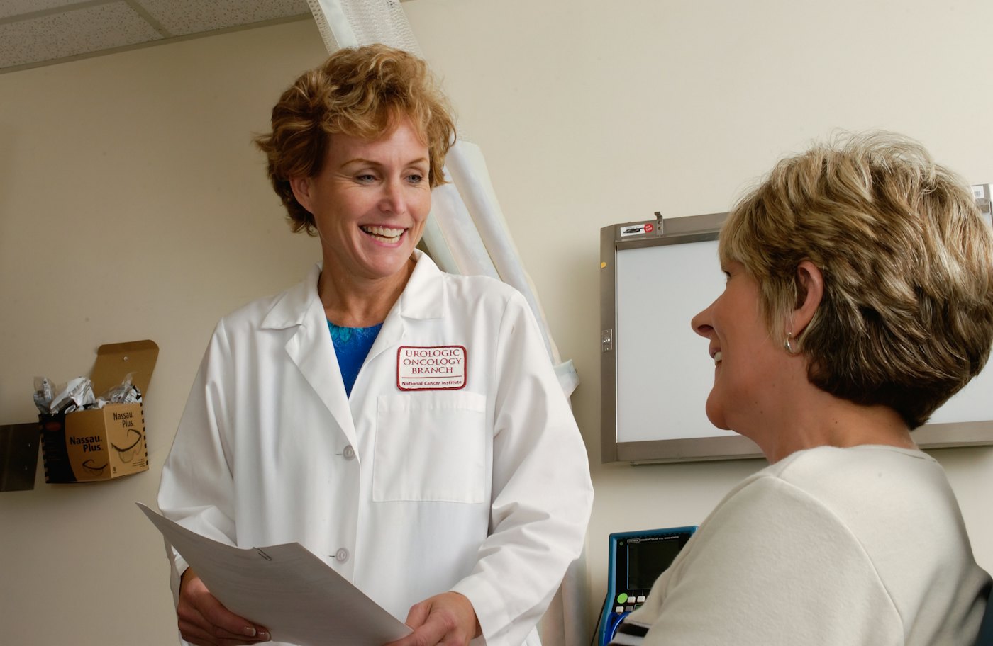 Physician consulting with a patient